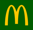 Un logo M jaune de McDonald's est centré sur un fond vert foncé.